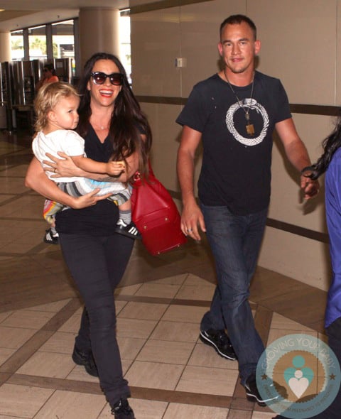 Alanis Morissette with husband Mario Treadway and son Ever LAX
