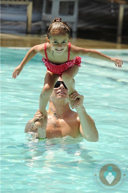 Casper Smart and Emme Anthony in the pool in Miami