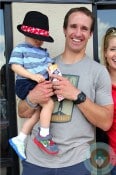 Drew brees with son Bowen in New Orleans