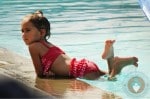 Emme Anthony by the pool in Miami