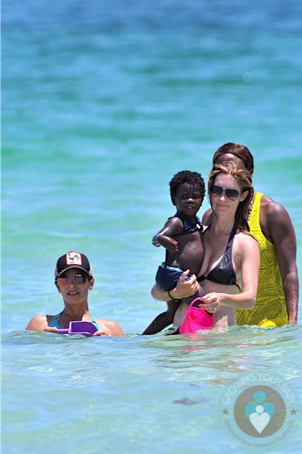 Jillian Michaels and her daughter, Lukensia enjoy the surf on Miami Beach  during Veteren's Day Featuring