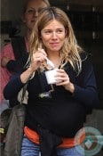Sienna Miller out in London with baby Marlowe