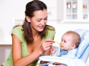 mom feeding baby