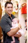 Actor Talon Smith with daughter at the Disney Baby Store Opening