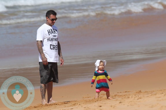 Carey Hart with daughter Willow at the beach in Australia