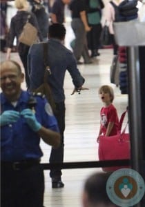 Colin Farrell walking through security with son Henry at LAX