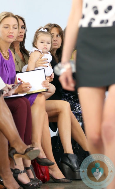 Harper Beckham sits front at Victoria's SS 13 show NYC