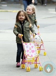Marion and Tabitha Broderick push their strollers through the city