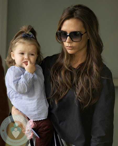 Victoria Beckham with baby Harper arriving in New York