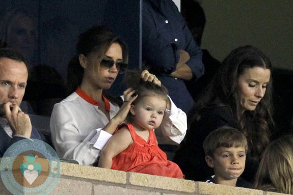 Victoria Beckham and baby daughter Harper watch hubby David Beckham play for the LA Galaxy against the Seattle Sounders in Los Angeles