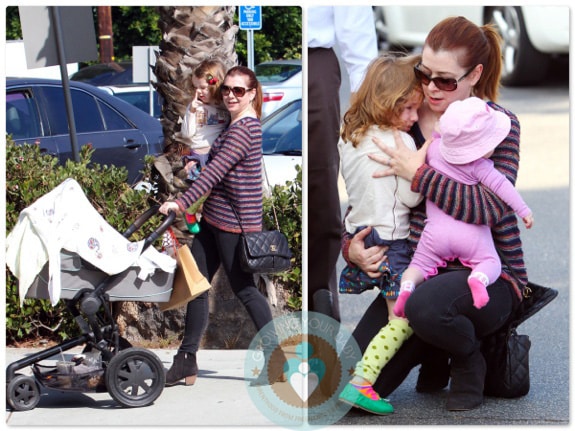 Alyson Hannigan juggles her daughters Keeva and Satyana in LA