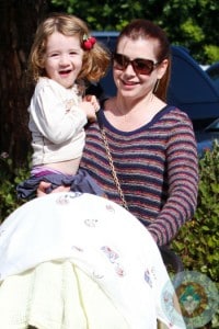 Alyson Hannigan has her hands full as she takes her daughters Satyana and Keeva out for lunch in Los Angeles