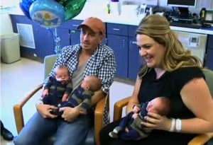 Brittany Deen and her husband, Jason with their record breaking triplets