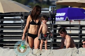 Jeff Gordon and wife Ingrid Vandebosh at the beach with their son Leo