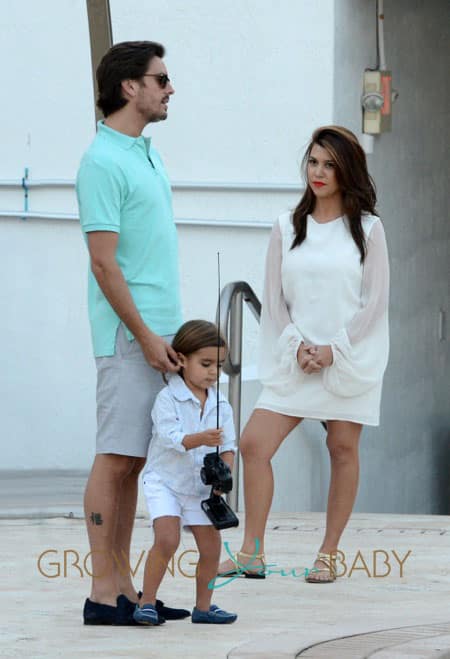 Kourtney Kardashian And Scott Disick Play With Mason At The Pool