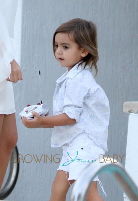 Kourtney Kardashian and Scott Disick Have Poolside Fun With Mason