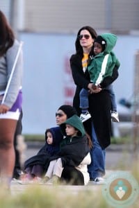 Sandra Bullock and her son Louis hang out with a very pregnant Camila Alves McConaughey and her children, Vida and Levi in New Orleans