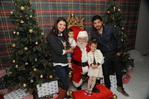 Ali Landry, husband Alejandro Monteverde, Estella, Marcelo pose with Santa - Photographer Noah Graham