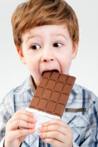 boy eating chocolate