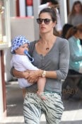 Alessandra Ambrosio holds her son Noah Mazur close, as they make a quick stop at the Brentwood Country Mart in Los Angeles
