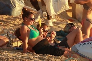 Coleen Rooney enjoys the sunset with her son Kai and other family members, while on holiday in Barbados