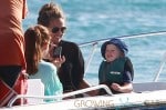 A pregnant Coleen Rooney, wife of Manchester United star Wayne Rooney, takes her son Kai out for some fun in the sun and sand in Barbados