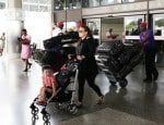 Heavily pregnant Coleen Rooney and family are spotted at Barbados airport shortly after arriving on a fight from the UK