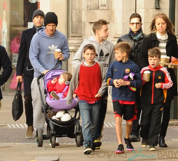 David Beckham seen pushing daughter Harper in her pram