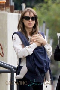 Natalie Portman carries her son Aleph in a Baby Bjorn carrier as she and fiance Benjamin Millepied are spotted out and about in Santa Monica