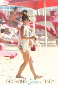Coleen Rooney enjoys a day at the beach with son Kai and her parents