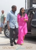 Pregnant reality TV star Kim Kardashian wears a pink dress while her and boyfriend rapper Kanye West visit the Christ the Redeemer statue in Rio De Janeiro