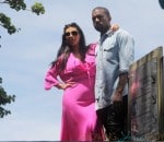 Pregnant reality TV star Kim Kardashian wears a pink dress while her and boyfriend rapper Kanye West visit the Christ the Redeemer statue in Rio De Janeiro