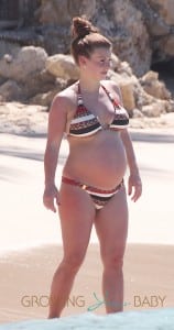 Coleen Rooney is pictured at the beach with Kai and her parents while on holiday in Barbados