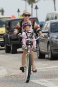 Pink and her husband Carey Hart take their daughter Willow for a bicycle ride in Fort Lauderdale, FL