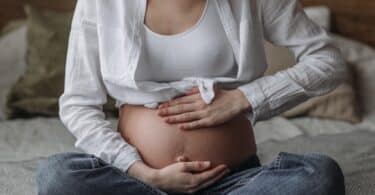 A Pregnant Woman Holding Her Baby Bump