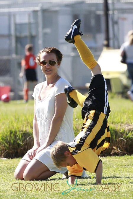 Britney Spears watches her sons Sean Preston and Jayden James play soccer before changing into a new outfit inside a clothing store