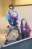 **EXCLUSIVE** Maggie Gyllenhaal has her hands full as she carts her kids and luggage through LAX in Los Angeles