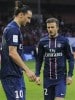 Paris Saint-Germain's Zlatan Ibrahimovic speaks with his teammate David Beckham during their French Ligue 1 soccer match against Nancy in Paris