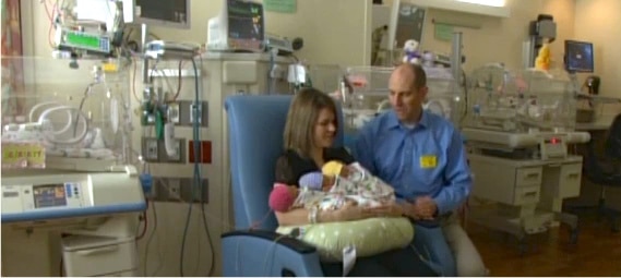 Brad and Laura Partridge with their identical triplets Sonja, Sylvia and Scarlett