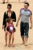 Halle Berry rocks a black bikini while hitting the beach with her fiance Olivier Martinez and adorable daughter Nahla Ariela Aubry in Hawaii