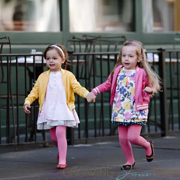Sarah Jessica Parker's twin daughters Marion and Tabitha spotted wearing spring outfits while holding hands and running in NYC