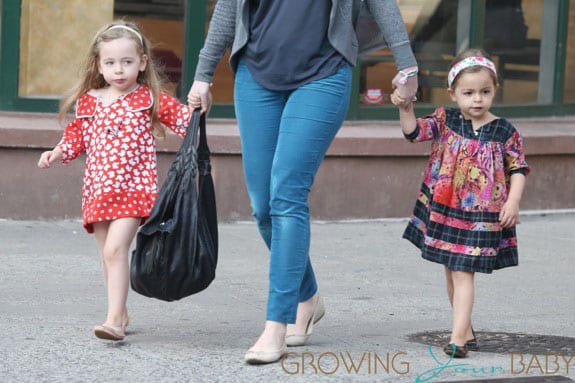 Sarah Jessica Parker's twins Marion and Tabitha Broderick wear pretty colorful frock dresses on their way to school in New York City