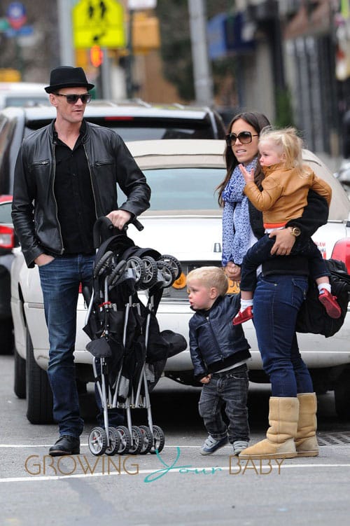 Neil Patrick Harris hails a taxi cab with his twins in Manhattan