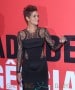 Halle Berry, showing off her baby bump in a revealing black dress, attends the premiere of 'The Call' in Rio de Janeiro
