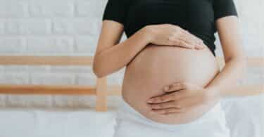 pregnant woman holding her belly(1)