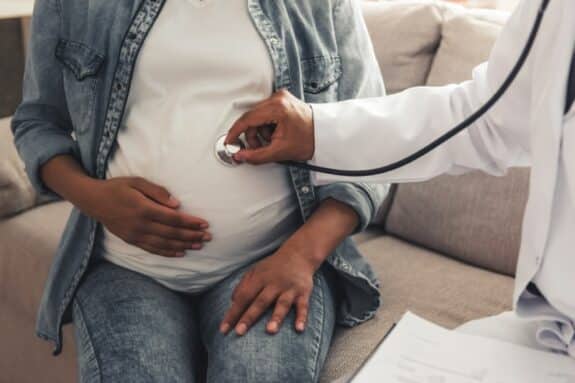 pregnant woman at the doctors