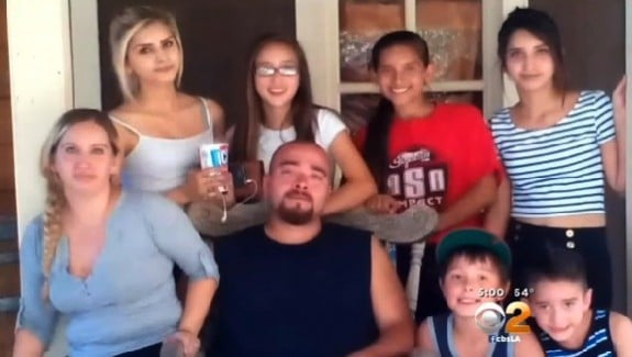 Lisa Avila(bottom left) and her family