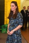 Pregnant Kate Middleton is all smiles spending time with the children while visiting Cape Hill Children's Centre in Smethwick, London