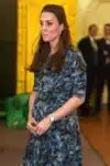 Pregnant Kate Middleton is all smiles spending time with the children while visiting Cape Hill Children's Centre in Smethwick, London