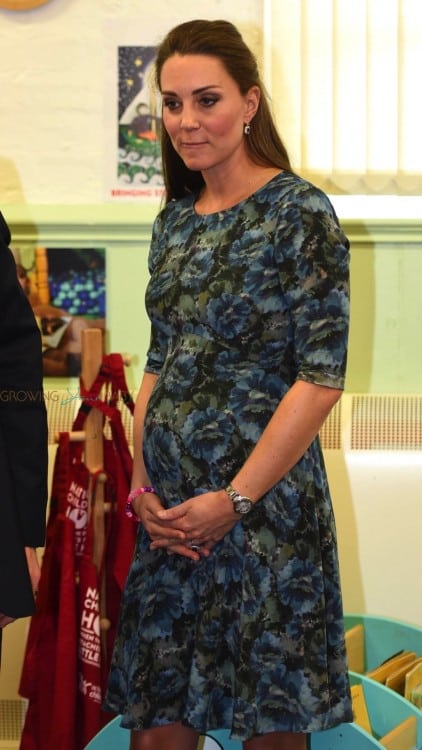 Pregnant Kate Middleton is all smiles spending time with the children while visiting Cape Hill Children's Centre in Smethwick, London